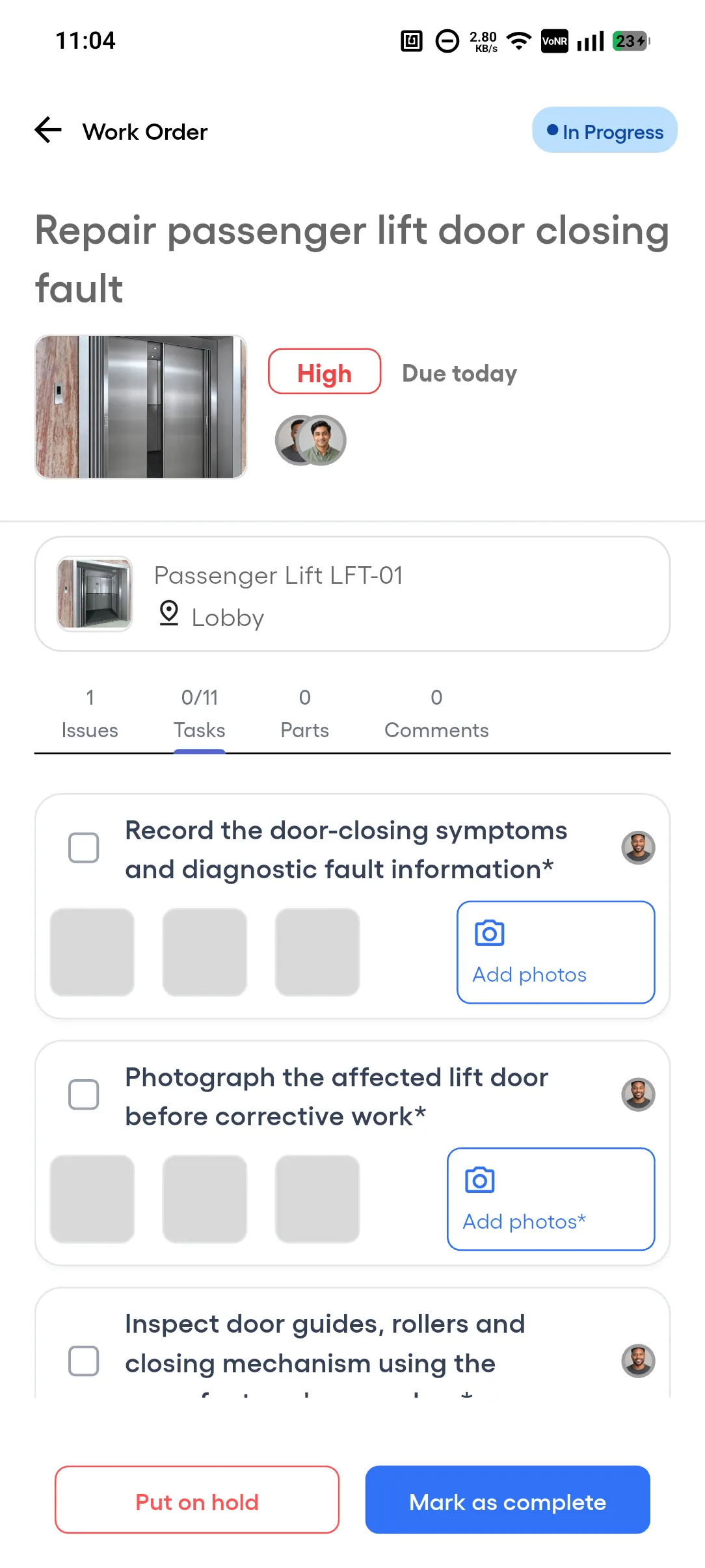 The Tasks tab of a work order in the Android app. Two tasks end in an asterisk: the first has an Add photos button, and the second has an Add photos* button.